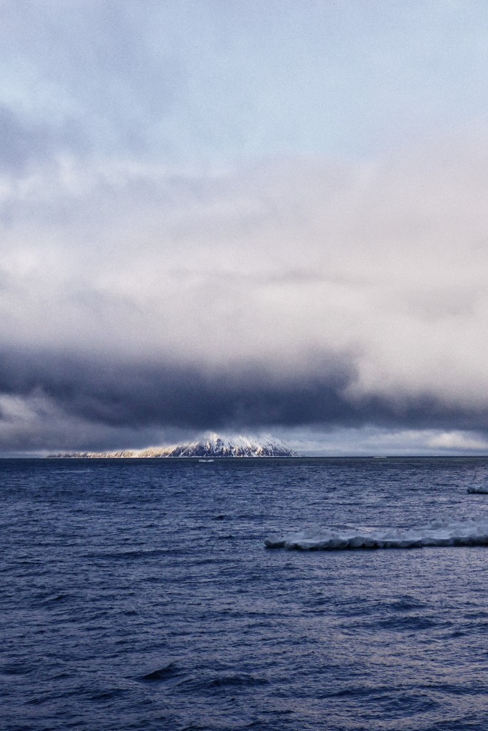 Fog lifts over Little Diomede Island