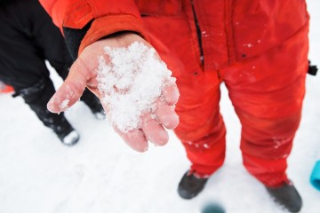 Chris holding "melt grain clusters" that suggest the onset of the melt back.